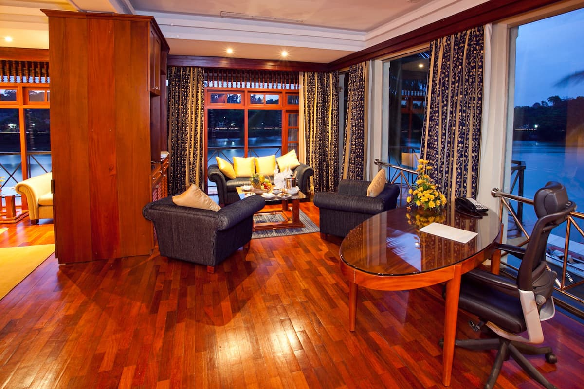One-Bedroom River Suite | Living area | 32-inch LCD TV with satellite channels, TV