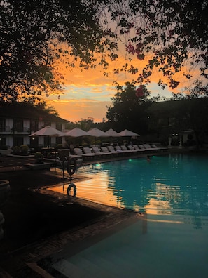 Outdoor pool, pool umbrellas, pool loungers