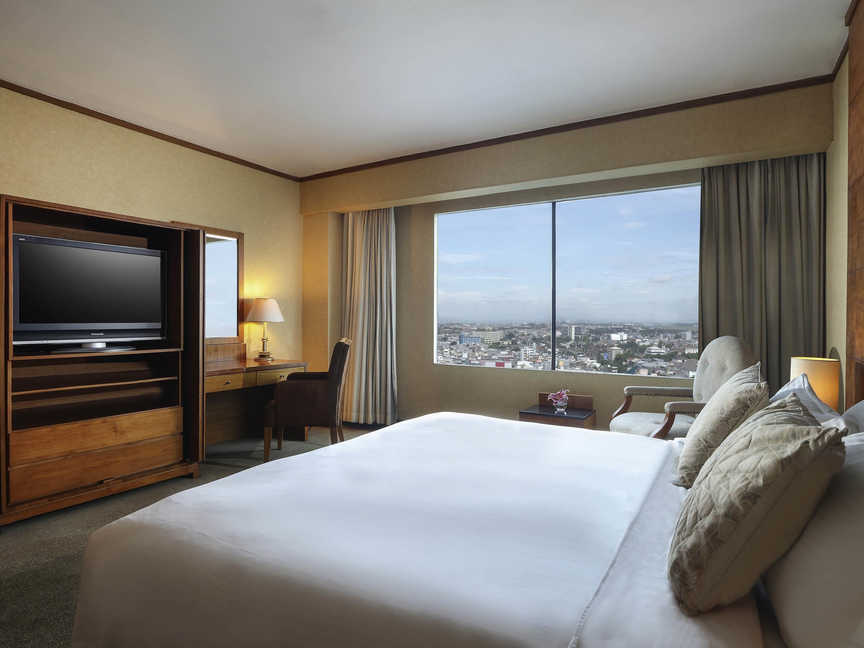 Suite Deluxe, 1 cama King size | Minibar, caja de seguridad en la habitación y escritorio 