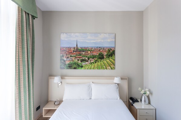 Economy Double Room, 1 Double Bed | Down comforters, minibar, in-room safe, desk