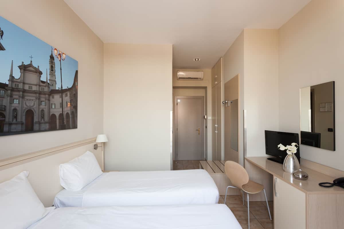 Twin Room | Down comforters, minibar, in-room safe, desk