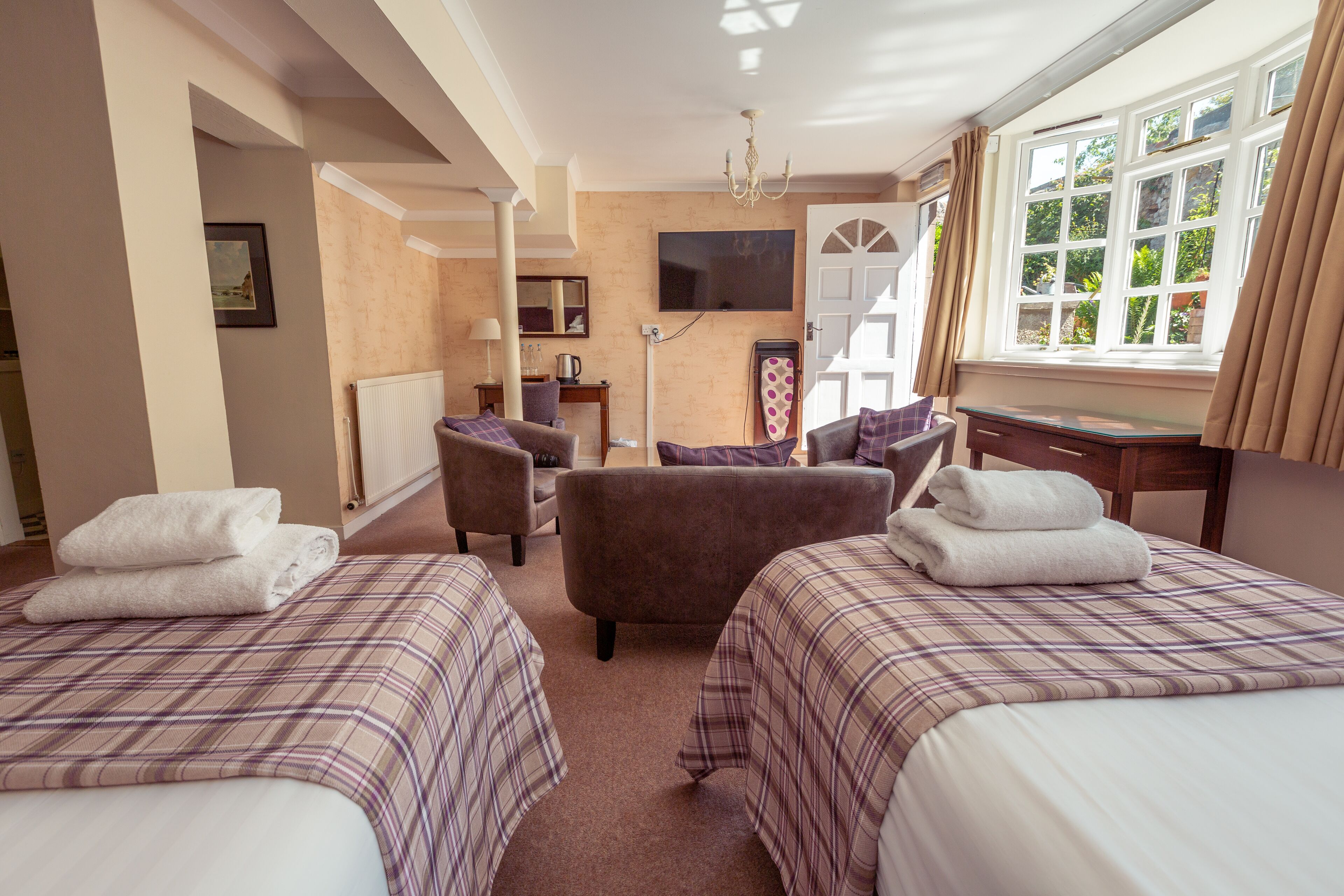 room, garden view | desk, blackout curtains, iron/ironing board, free wifi