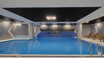 Indoor pool, open 7:00 AM to 10:30 PM, pool loungers