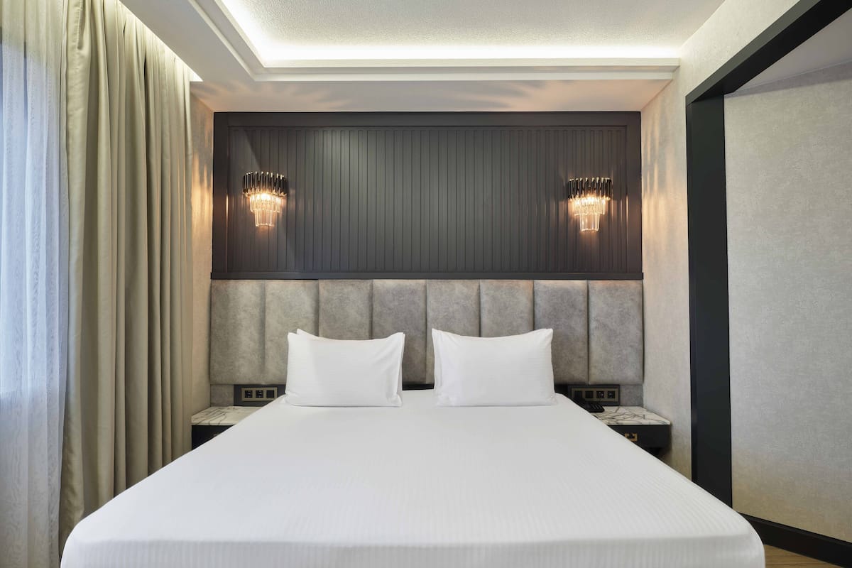 Junior suite, 1 slaapkamer | Lakens van Egyptisch katoen, luxe beddengoed, een minibar