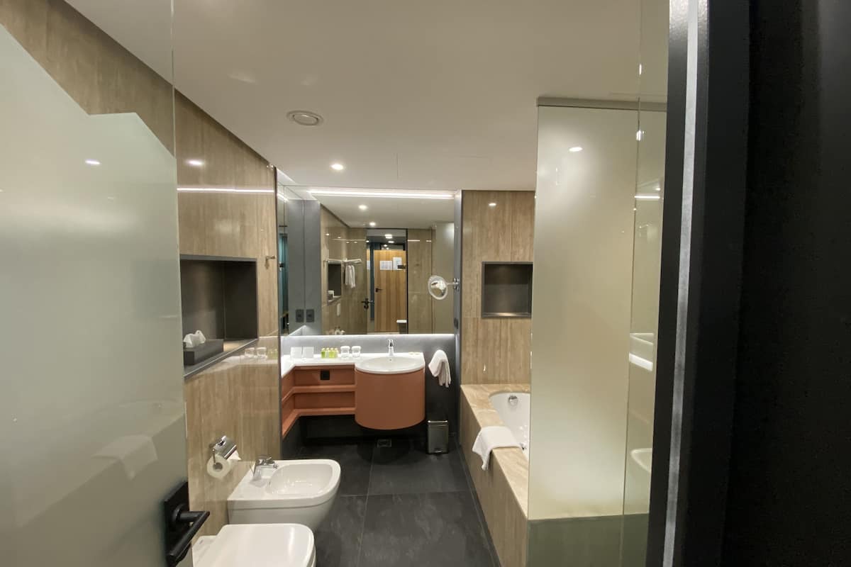 superior double room | bathroom | free toiletries, hair dryer, slippers, towels