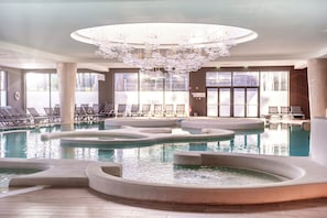Indoor pool, open 2:00 PM to 8:00 PM, sun loungers, lifeguards on site