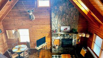 Cabin, 2 Bedroom | Living area | 32-inch flat-screen TV with satellite channels, TV