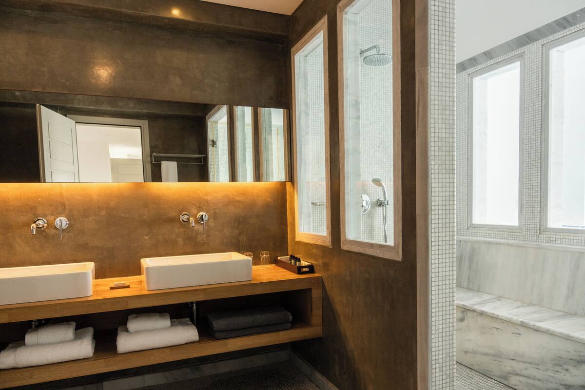 suite (grace with plunge pool) | bathroom | hair dryer, bathrobes, slippers, towels