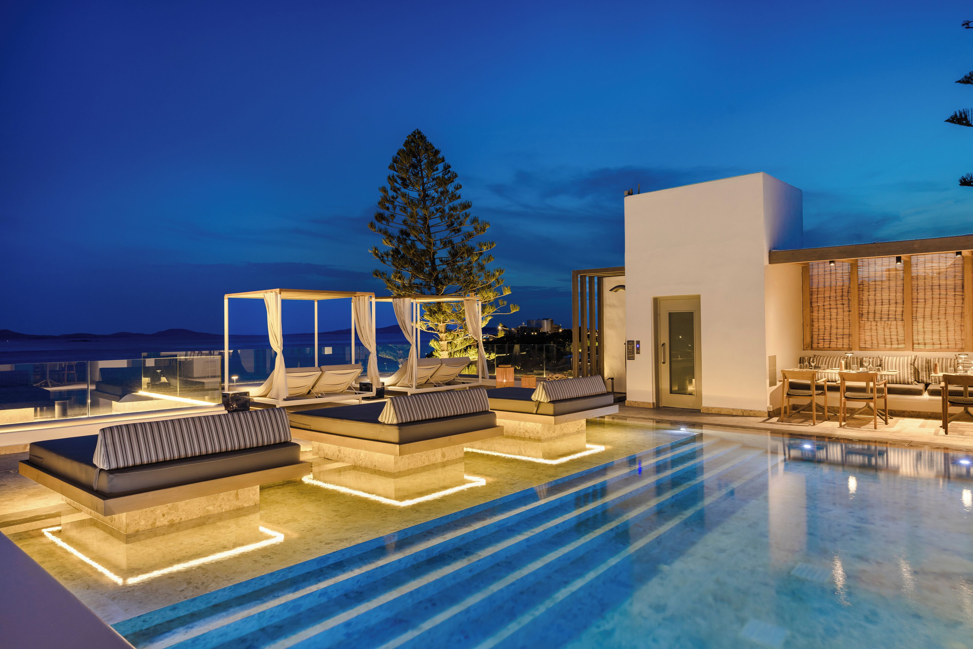 Outdoor pool, open 11:00 AM to 7:00 PM, pool umbrellas, sun loungers