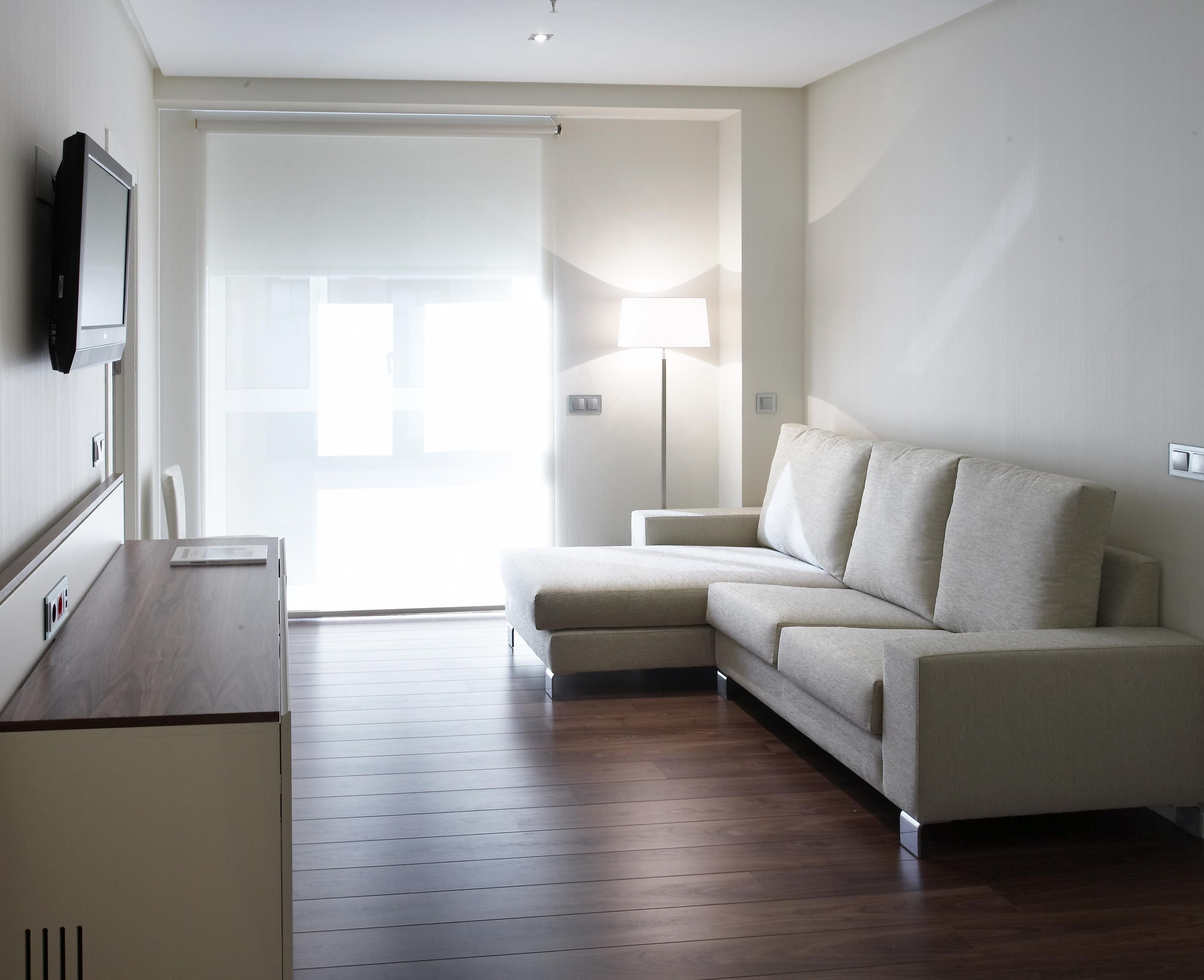 junior suite, 1 king bed | living area | 32-inch lcd tv with cable channels, tv