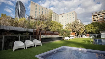2 outdoor pools, open 10:00 AM to 9:00 PM, pool loungers