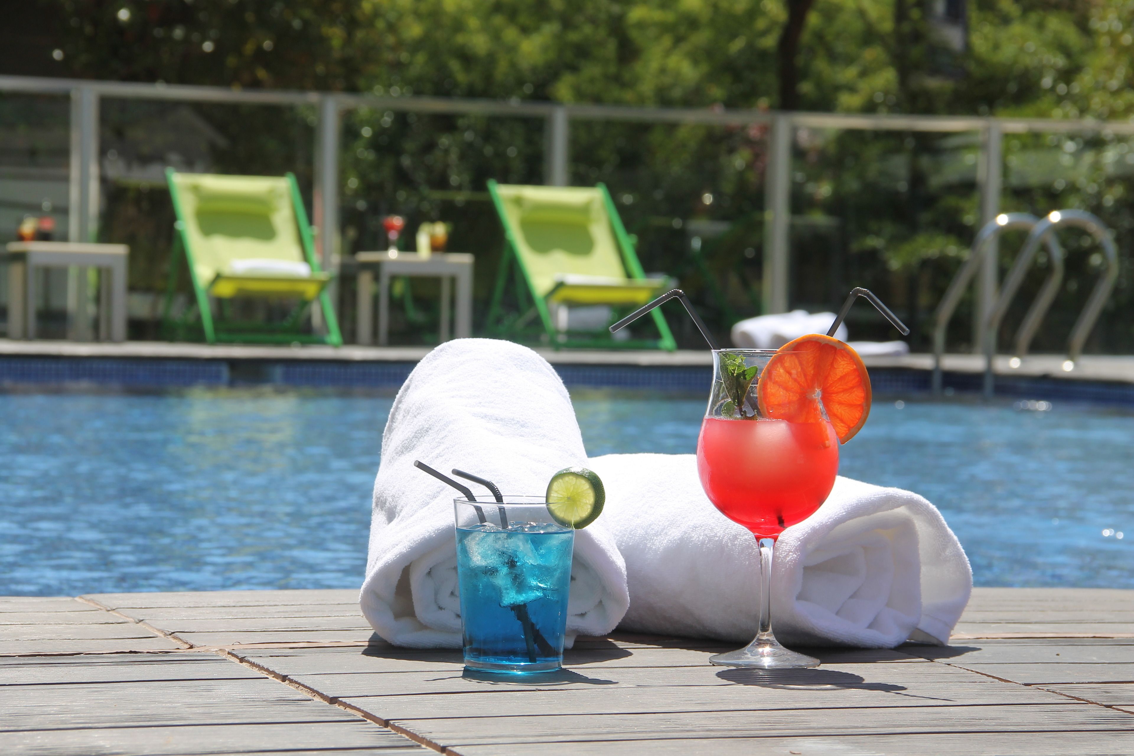 2 outdoor pools, open 10:00 AM to 9:00 PM, pool loungers