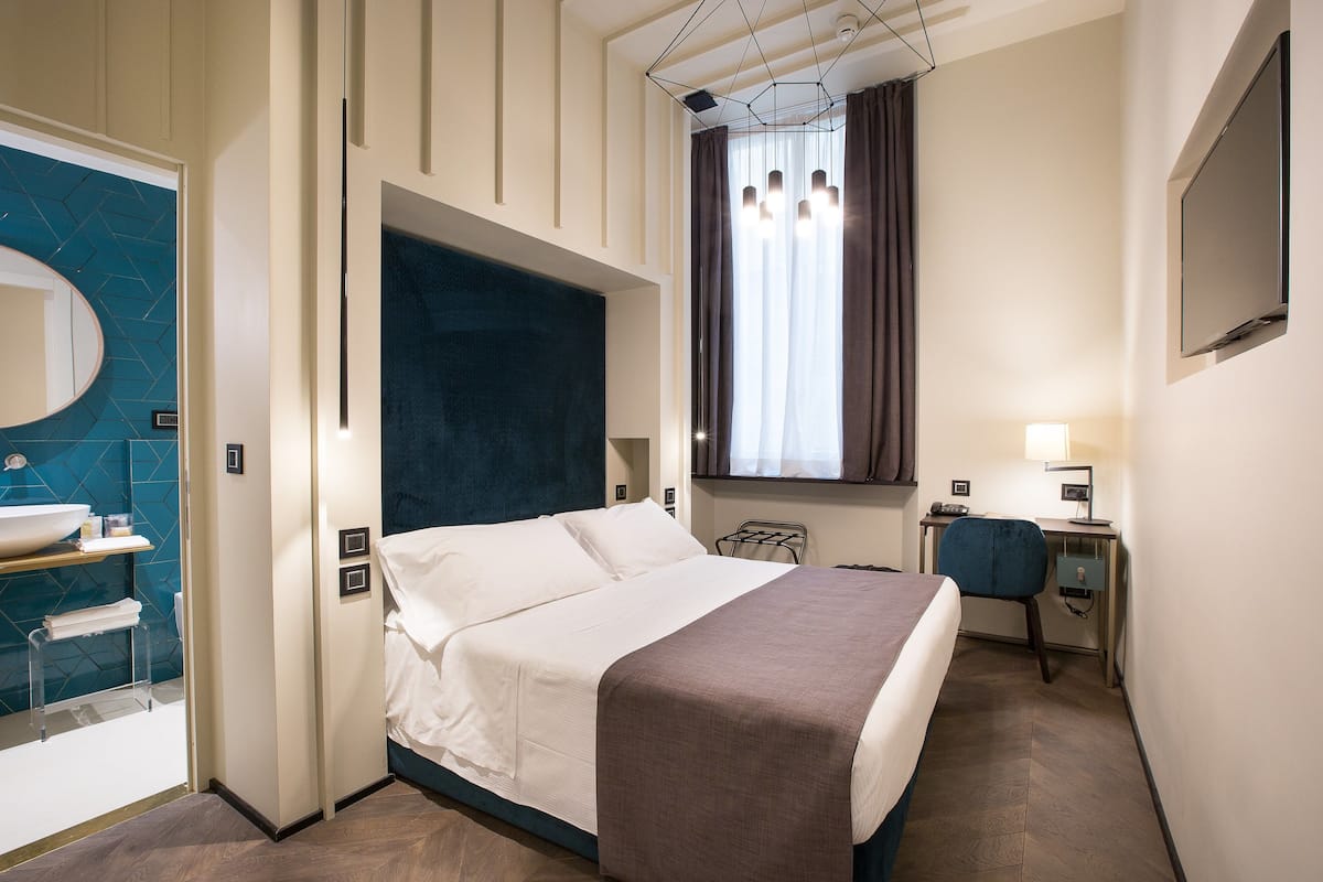 Premium Double Room Single Use | Minibar, in-room safe, desk, blackout curtains
