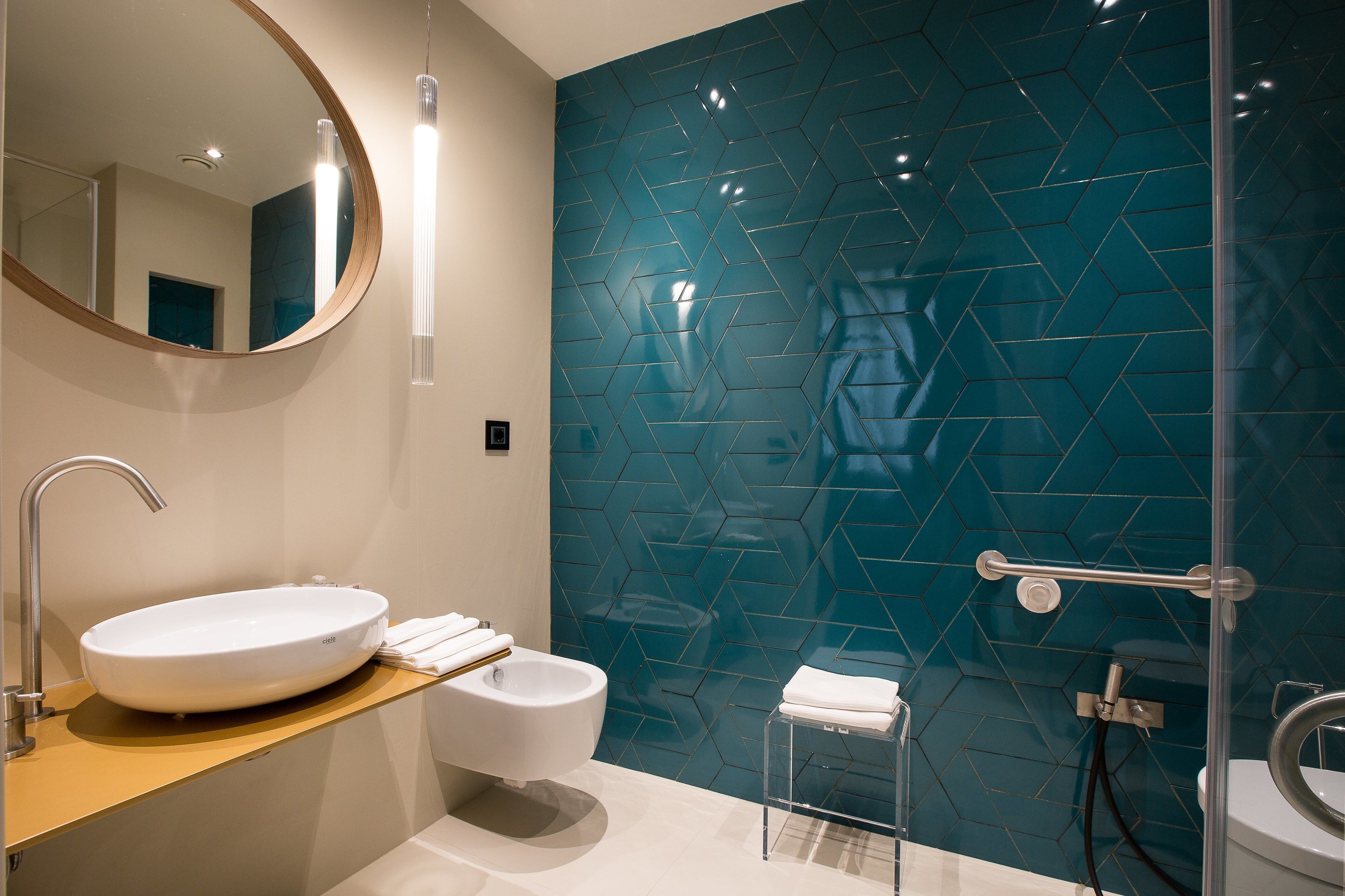 premium quadruple room | bathroom | combined shower/bathtub, free toiletries, hair dryer, bidet