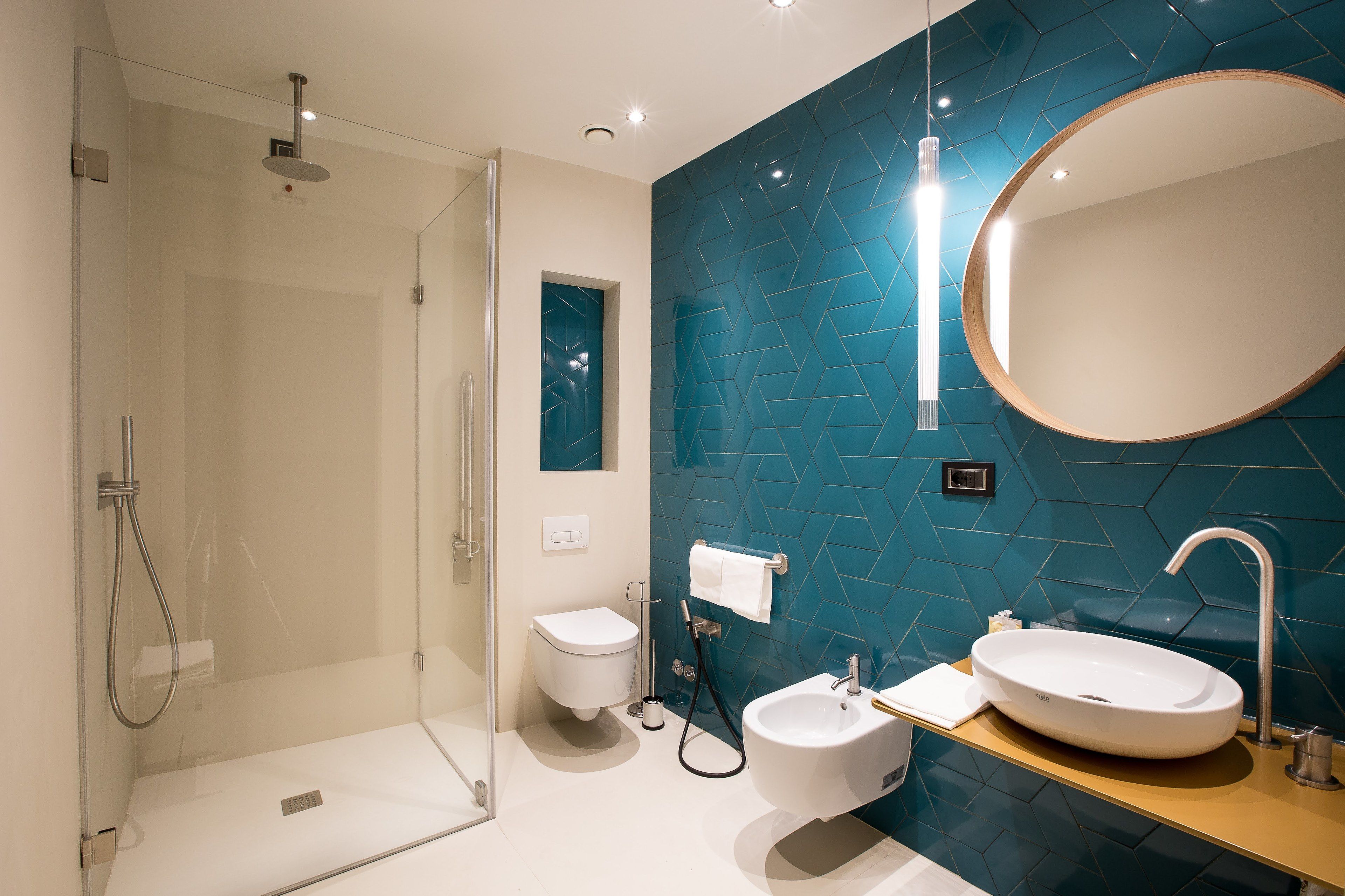 premium triple room | bathroom | combined shower/bathtub, free toiletries, hair dryer, bidet