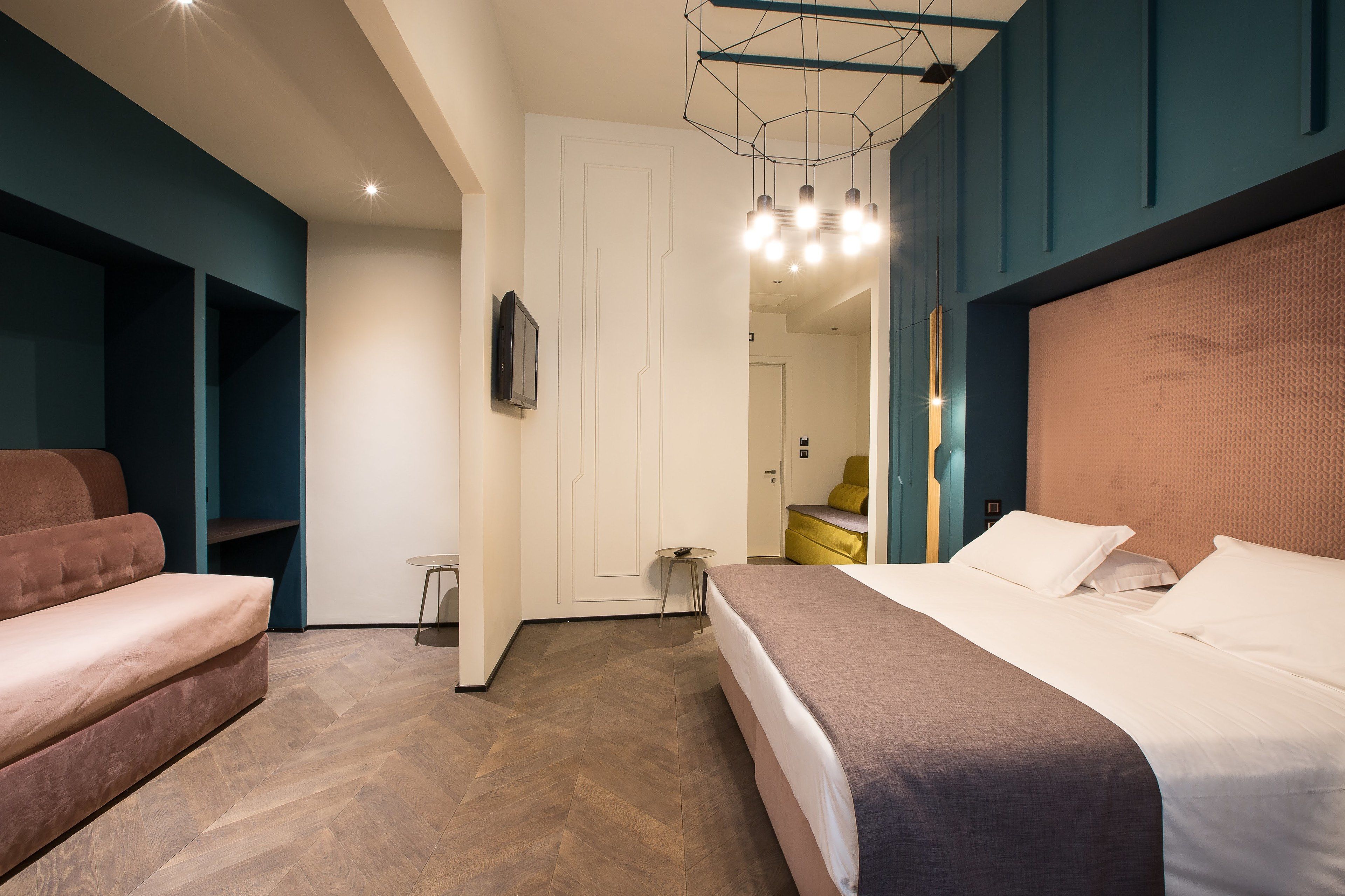 premium triple room | minibar, in-room safe, desk, blackout curtains