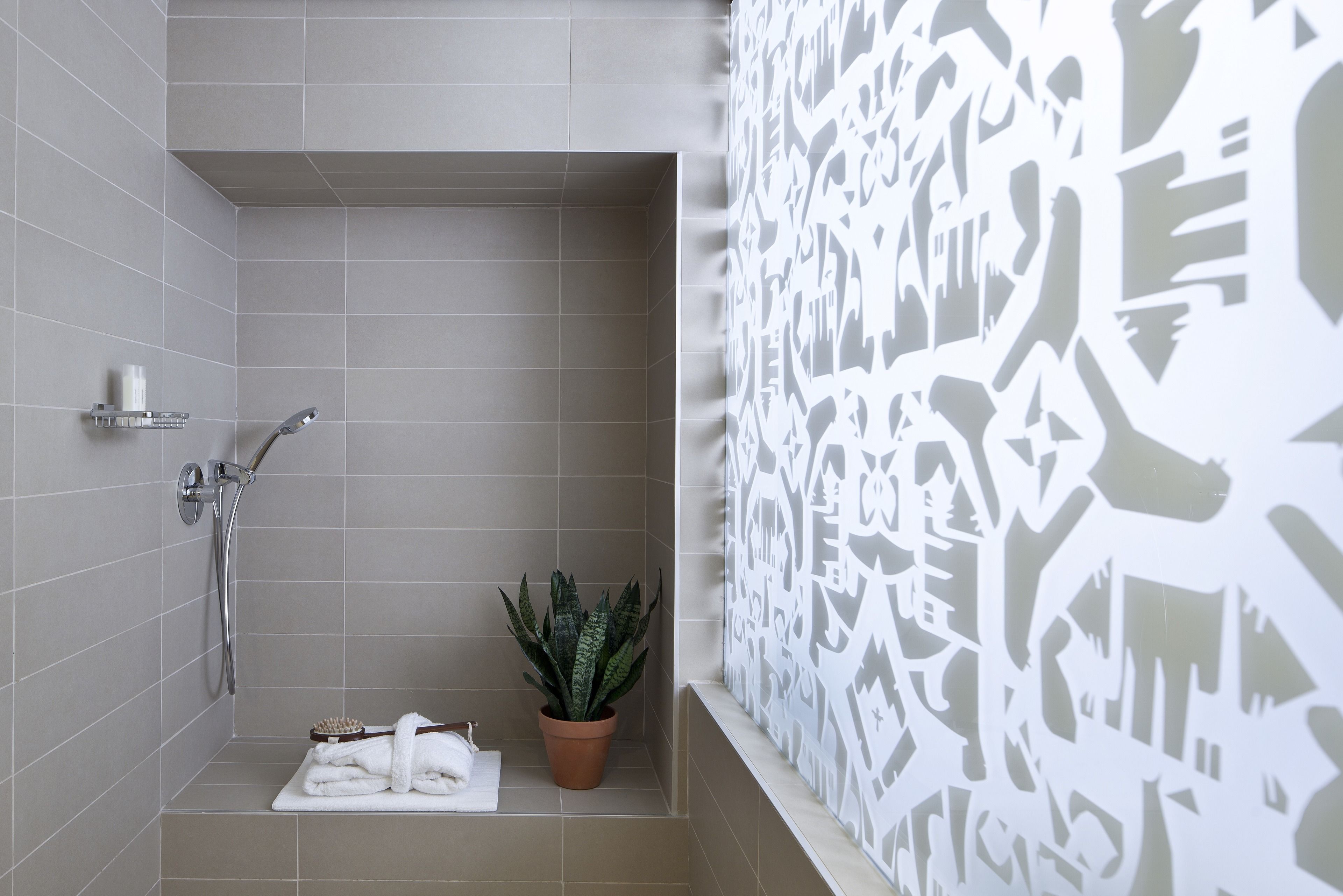 superior room | bathroom | rainfall showerhead, designer toiletries, hair dryer, towels