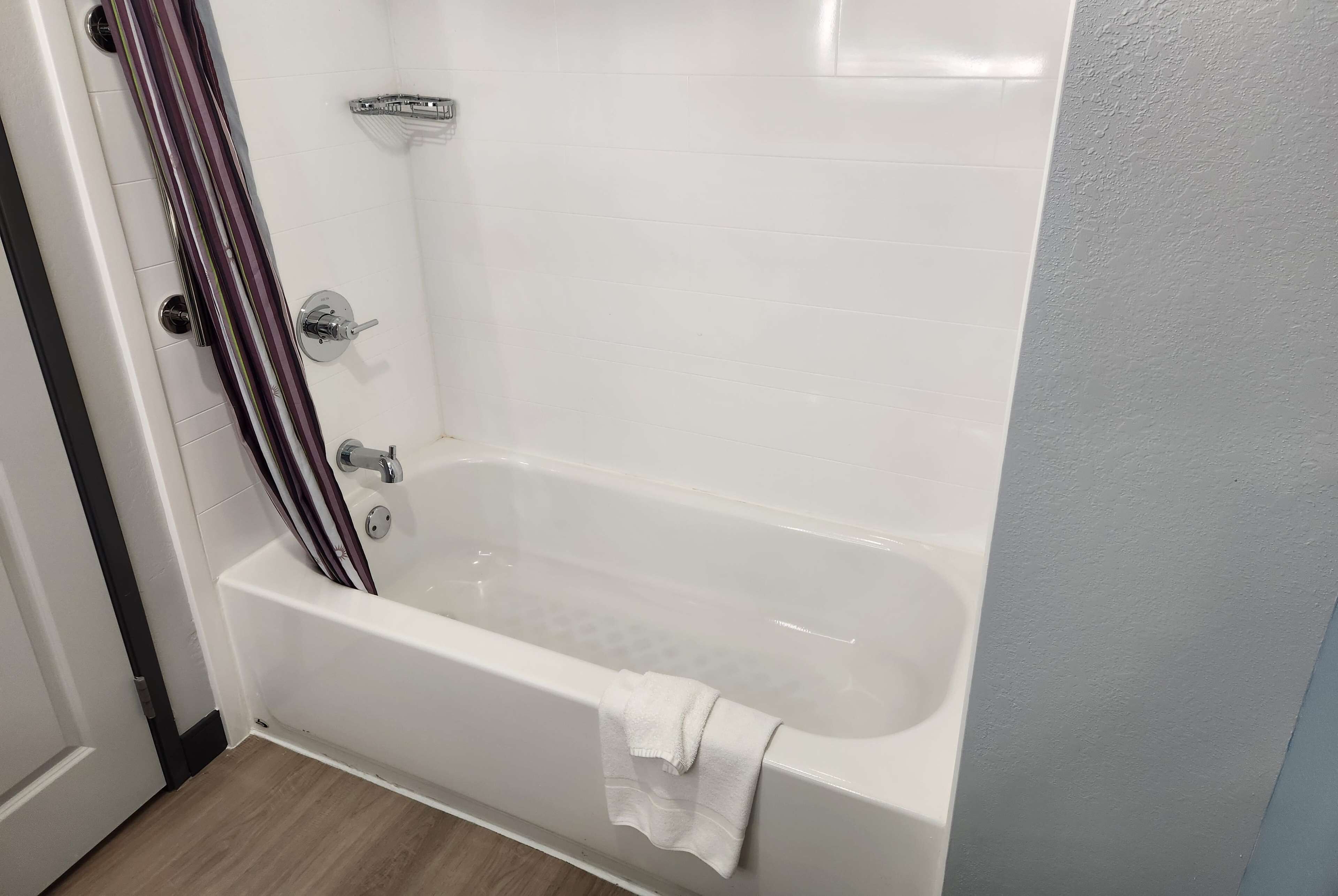 premium bedding, desk, laptop workspace, iron/ironing board