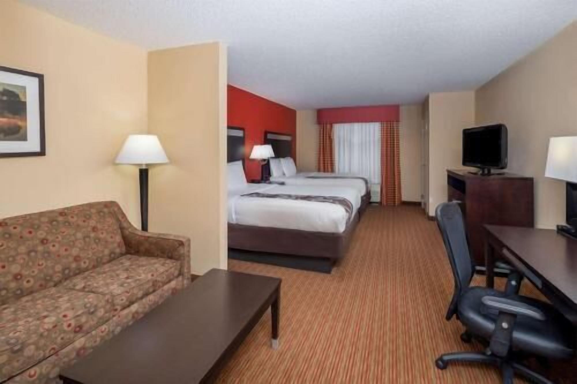 Premium bedding, desk, laptop workspace, iron/ironing board