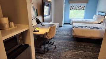 Premium bedding, desk, laptop workspace, iron/ironing board