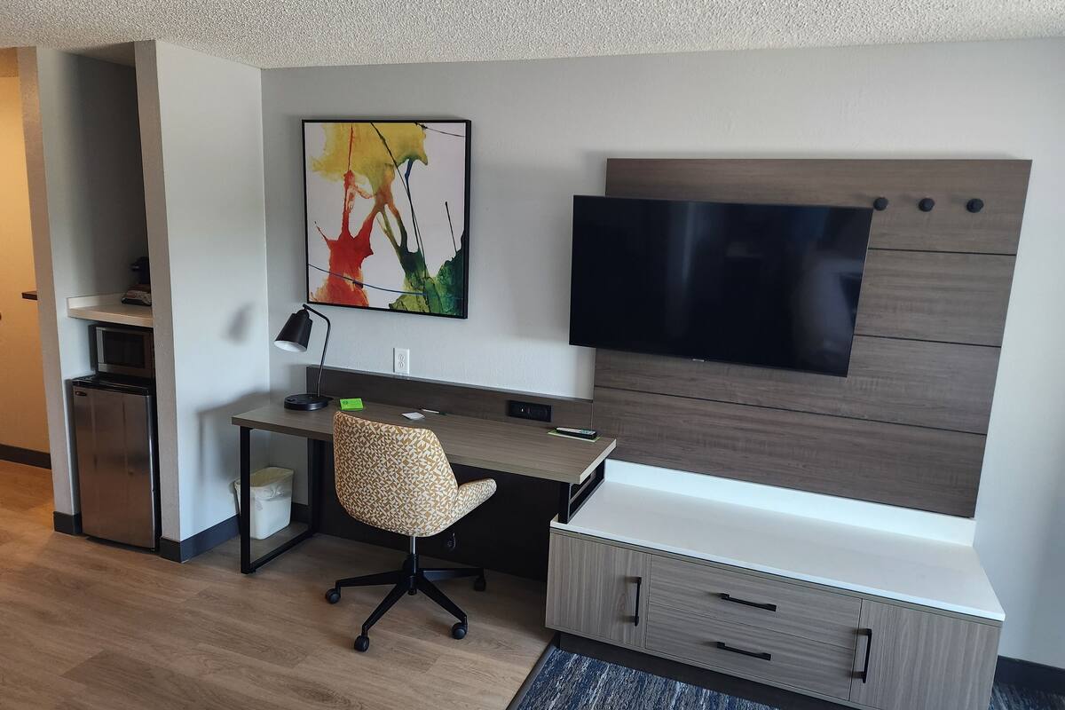 premium bedding, desk, laptop workspace, iron/ironing board