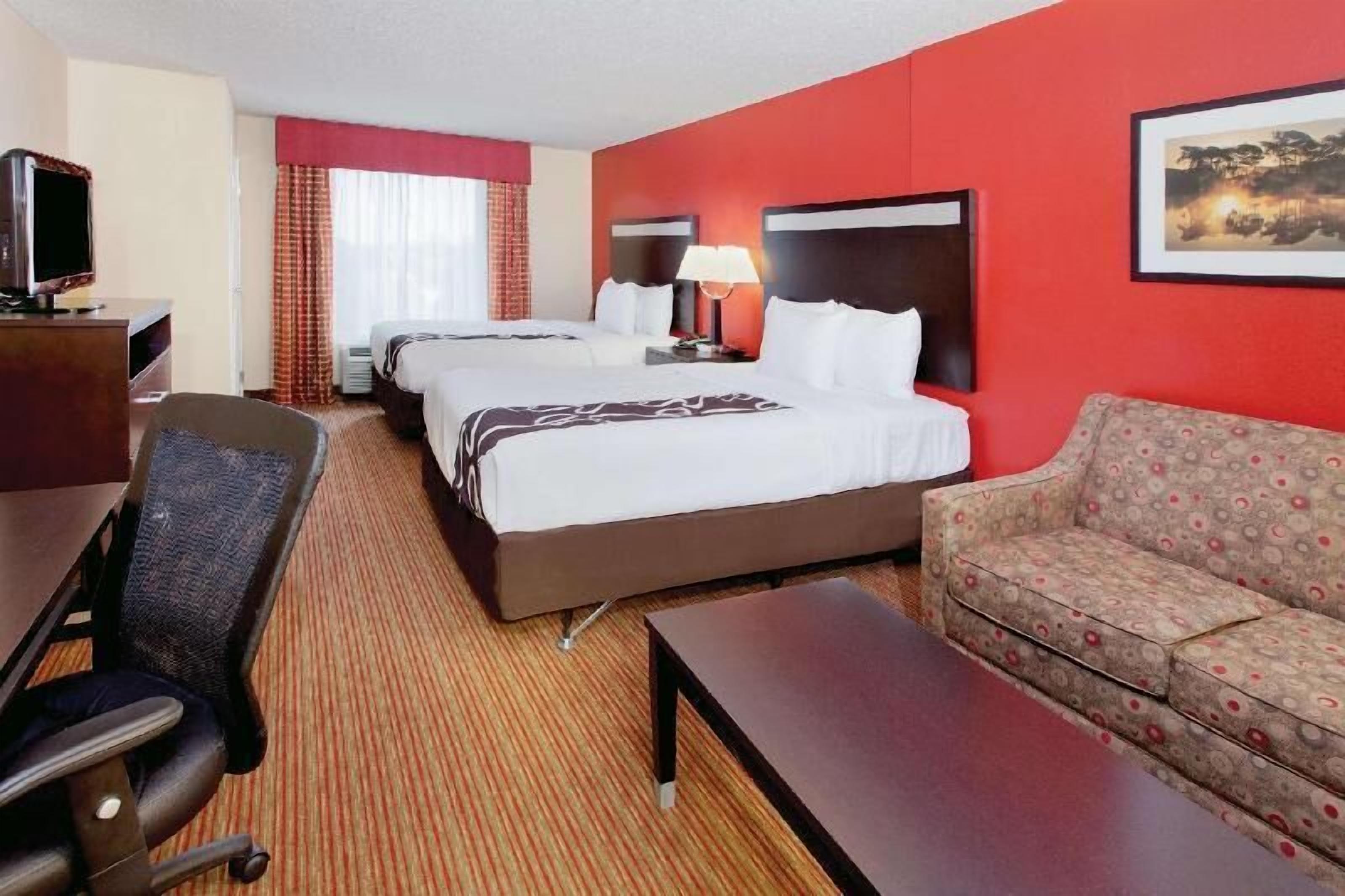 Premium bedding, desk, laptop workspace, iron/ironing board