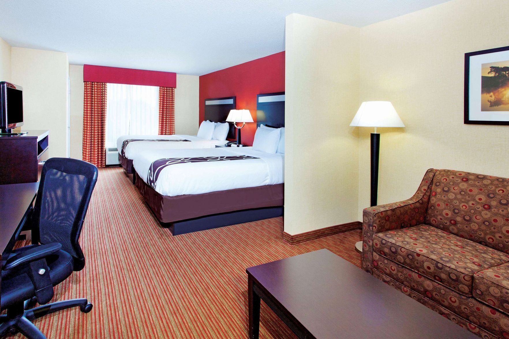 Premium bedding, desk, laptop workspace, iron/ironing board
