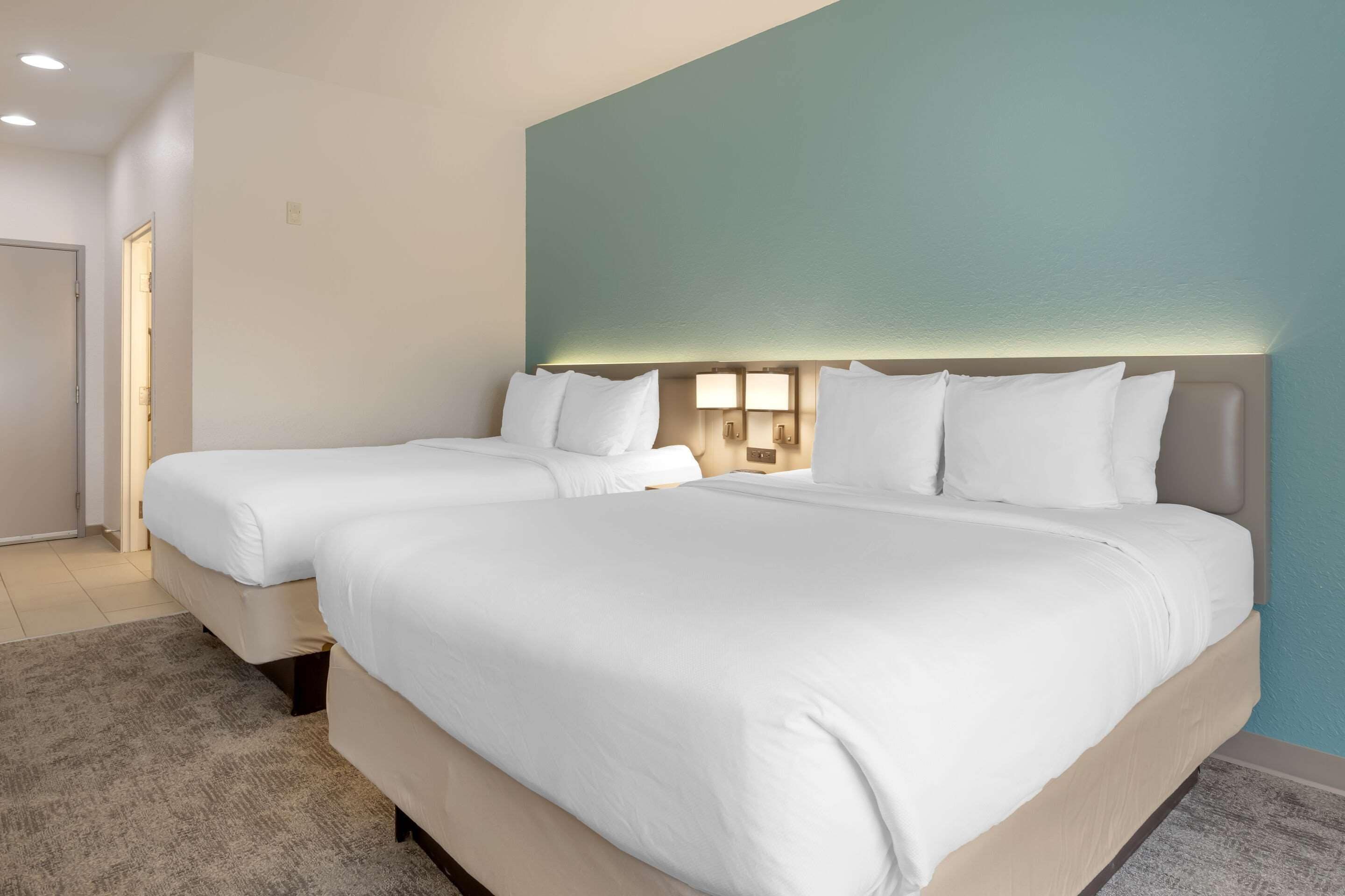 standard room, 2 queen beds, non smoking | desk, blackout curtains, iron/ironing board, free wifi