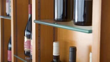 A wine rack with bottles labeled "LITTI" and "Dionne Burrello".