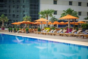 Outdoor pool, pool umbrellas, pool loungers