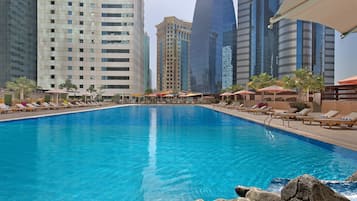 Outdoor pool, pool umbrellas, pool loungers