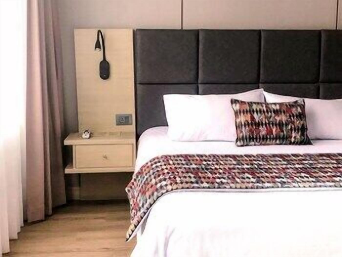 Premium bedding, down duvets, in-room safe, desk