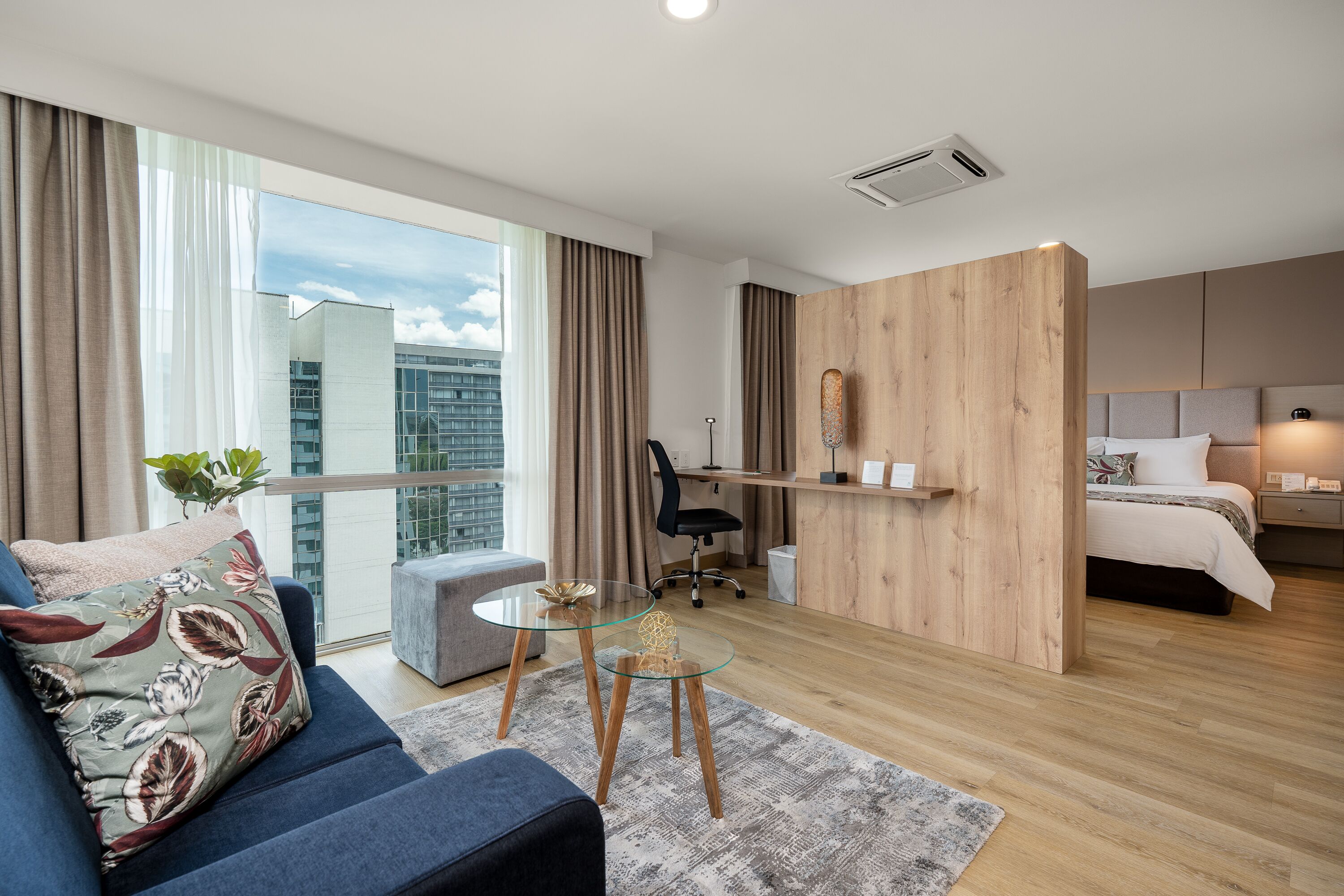 deluxe suite, 1 queen bed with sofa bed | living area | 49-inch smart tv with satellite channels, tv