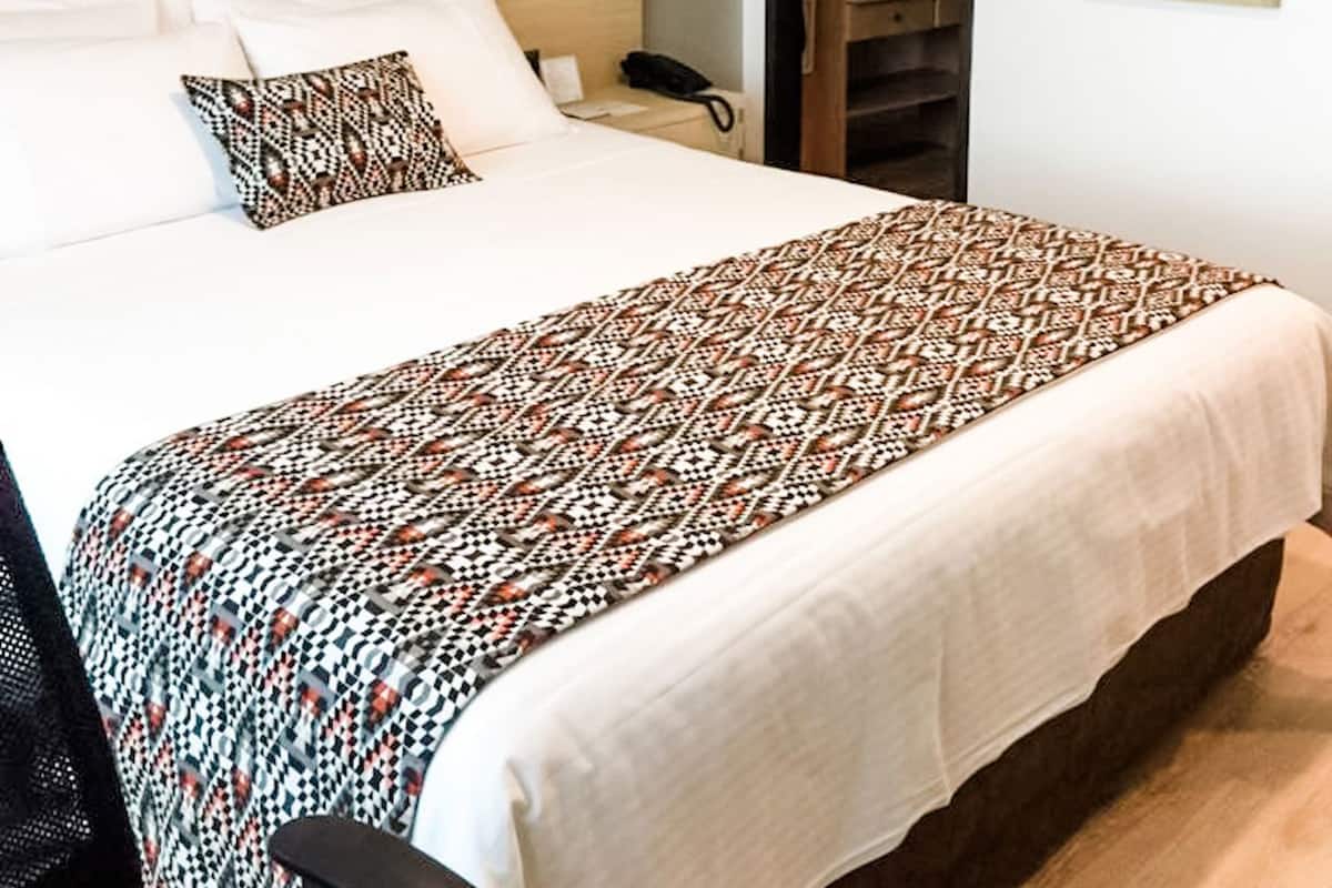 Premium bedding, down comforters, in-room safe, desk