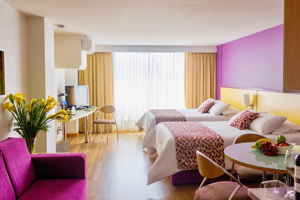 Premium bedding, down comforters, in-room safe, desk