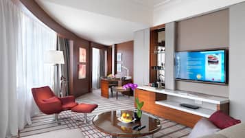 Premium bedding, down comforters, free minibar items, in-room safe