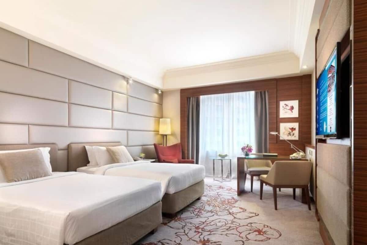 Premium bedding, down comforters, free minibar items, in-room safe