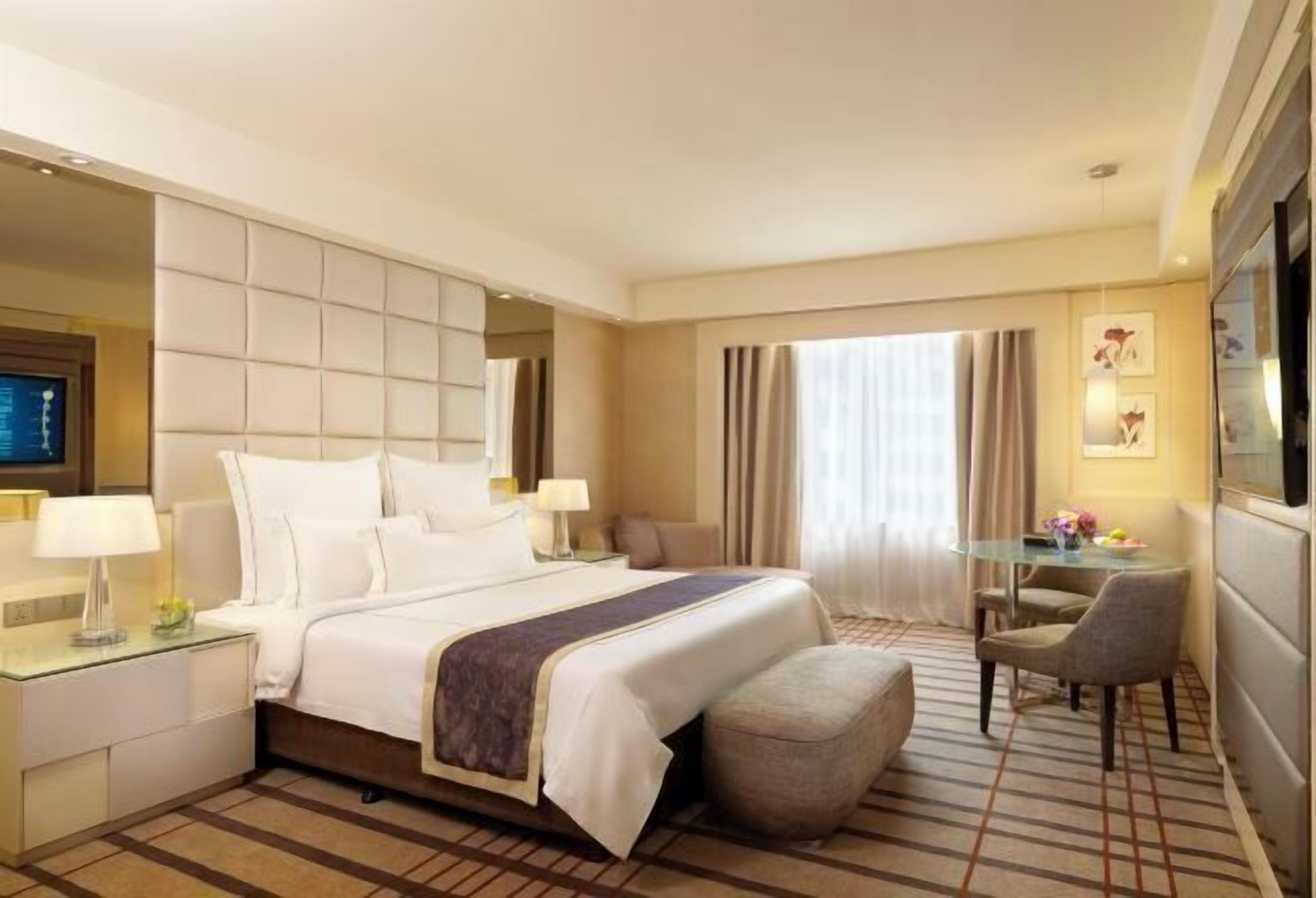 Premium bedding, down duvets, free minibar items, in-room safe