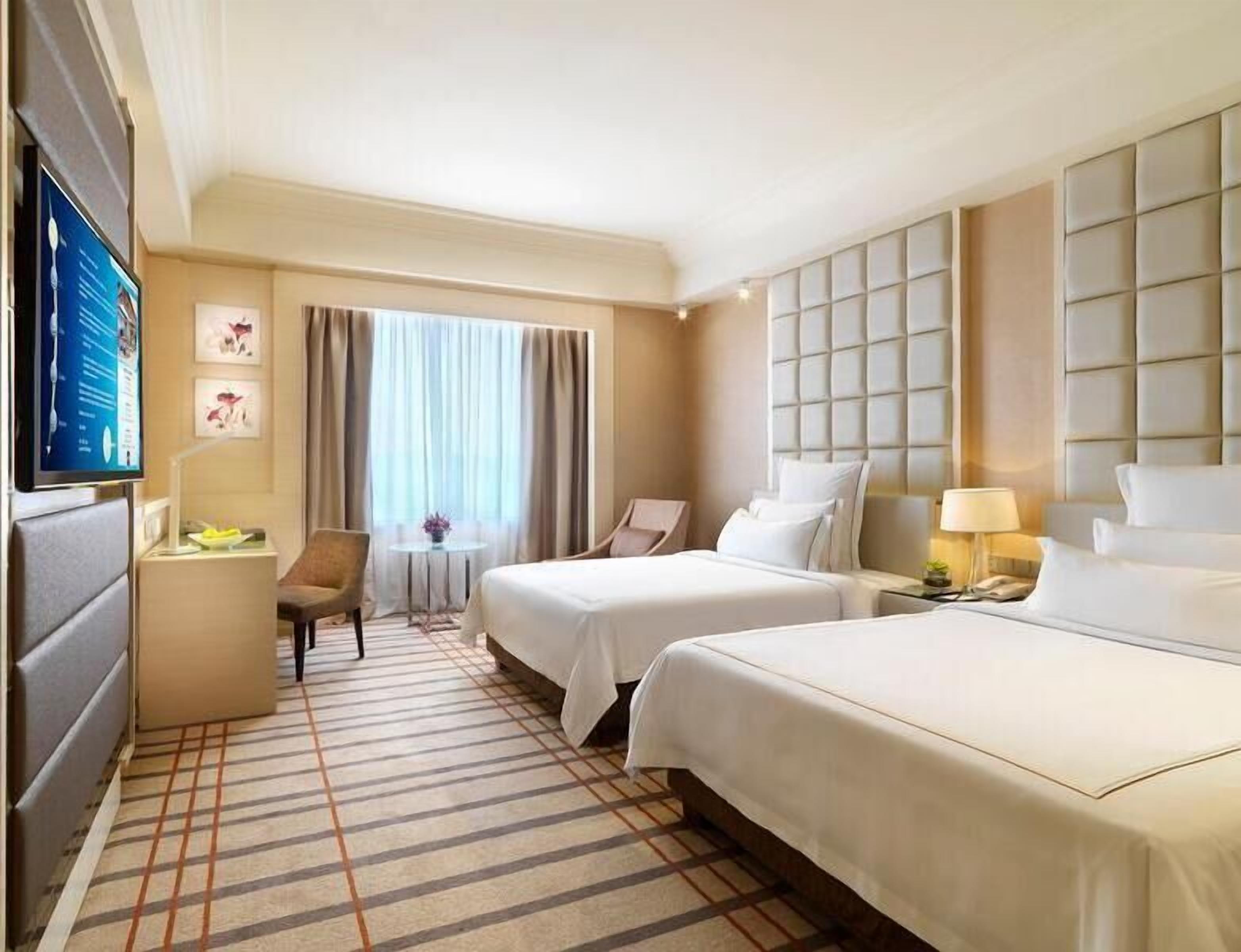 Premium bedding, down comforters, free minibar items, in-room safe