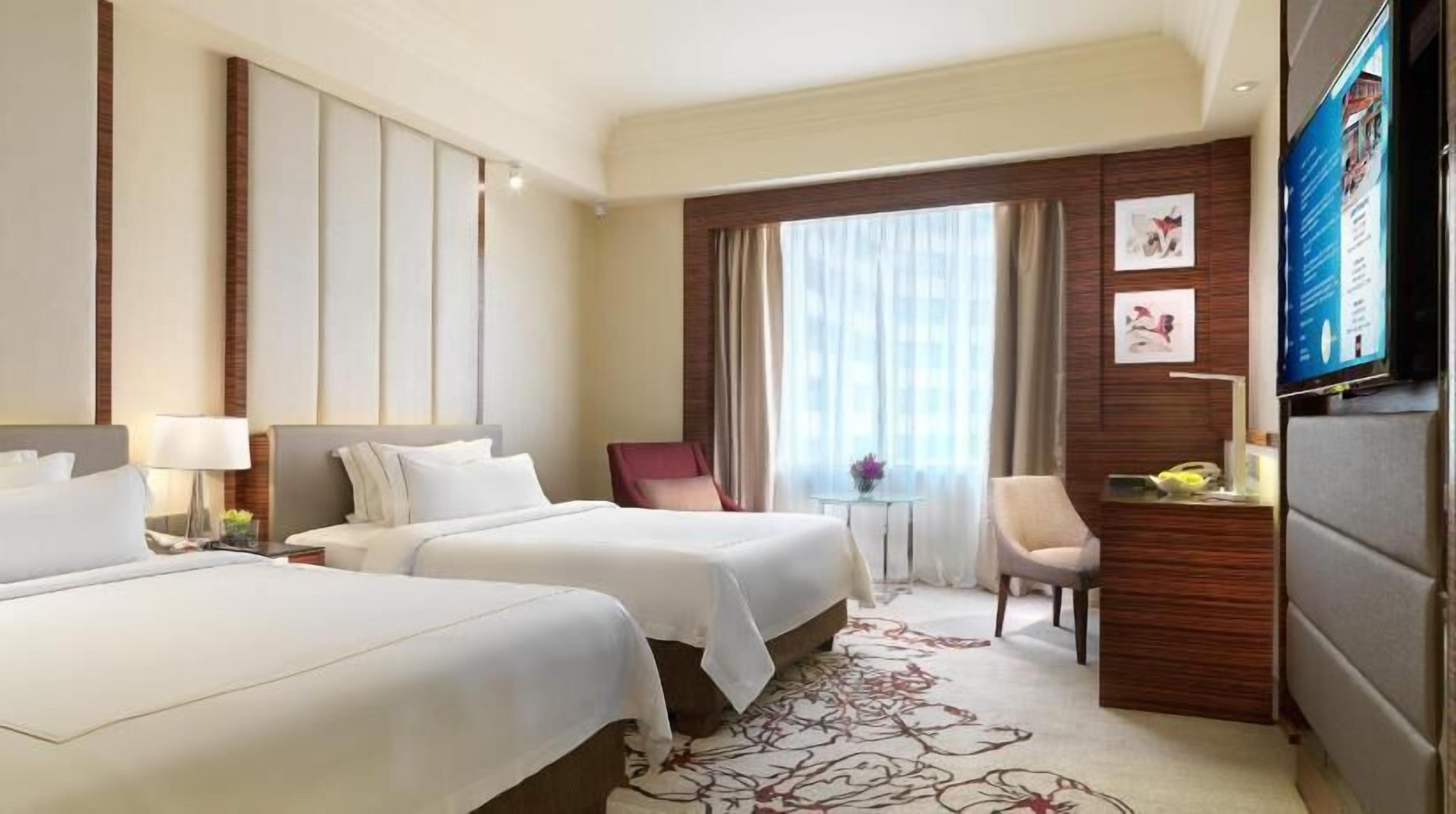 Premium bedding, down comforters, free minibar items, in-room safe