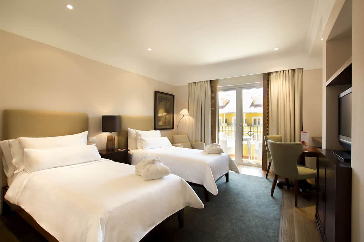 Room, 2 Single Beds, Patio | 1 bedroom, in-room safe, blackout curtains, free WiFi