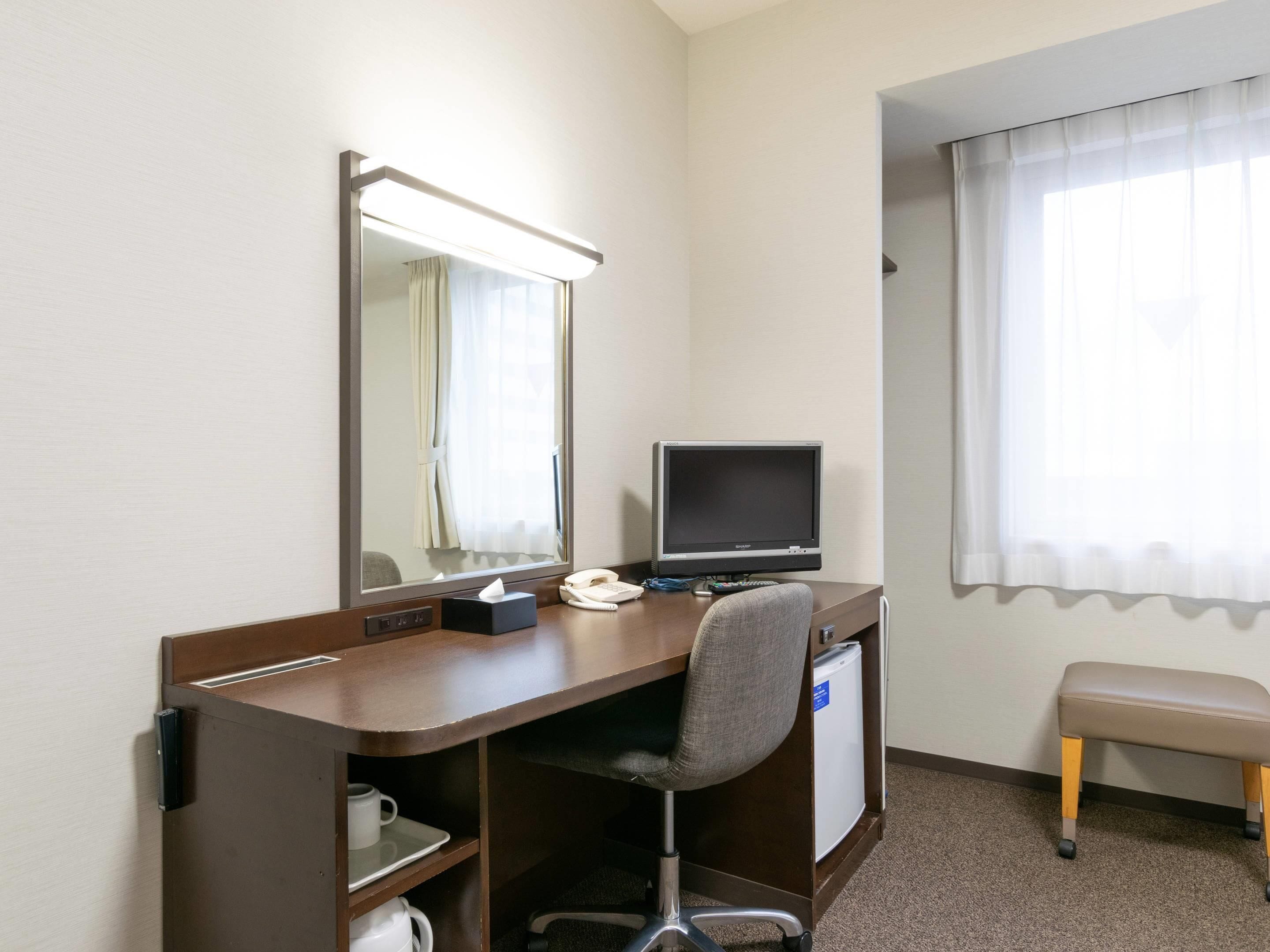 Premium bedding, desk, blackout curtains, soundproofing