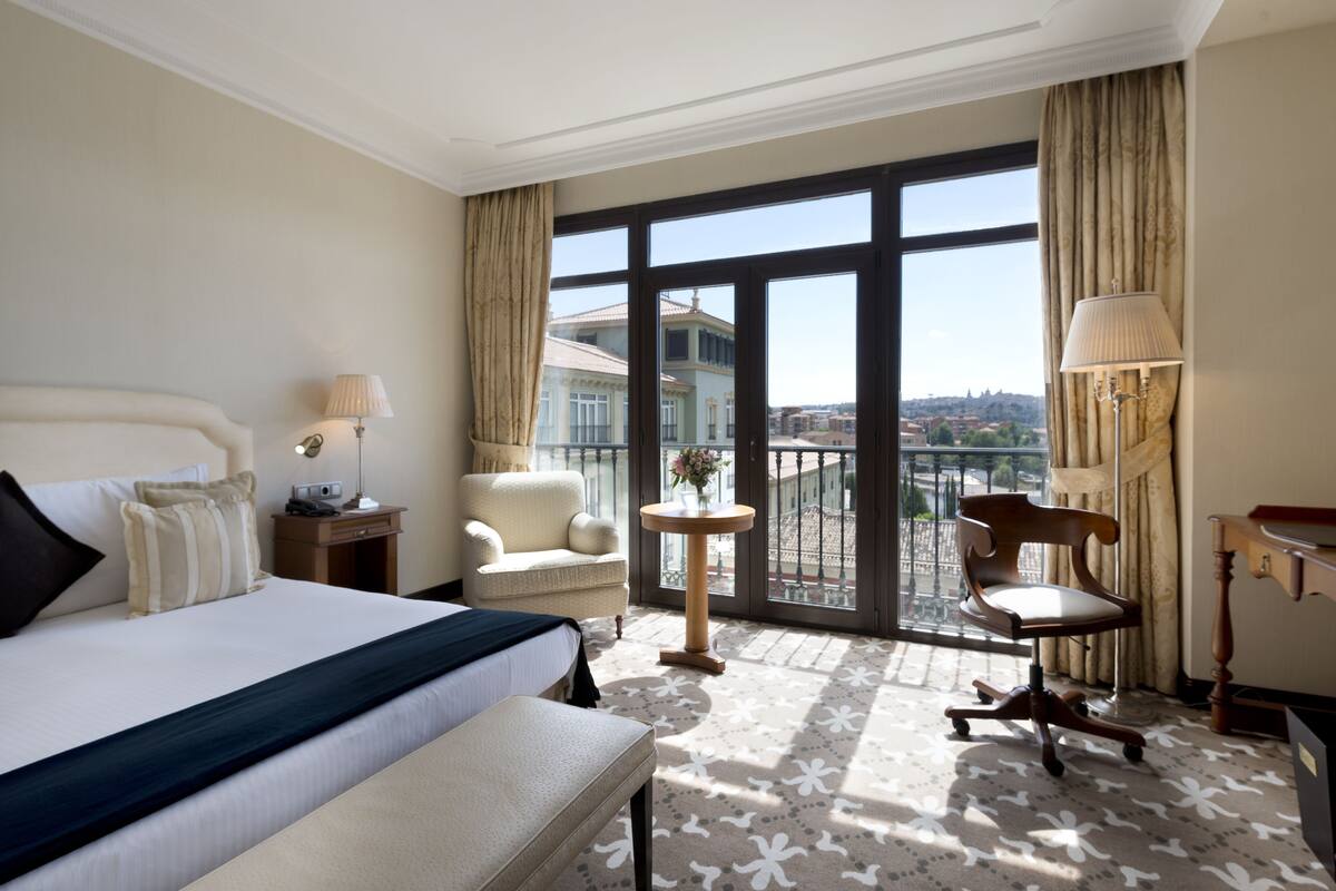 junior suite | minibar, in-room safe, desk, laptop workspace