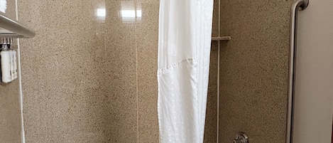 Standard Room, 1 King Bed, Non Smoking | Bathroom | Shower, free toiletries, hair dryer, towels