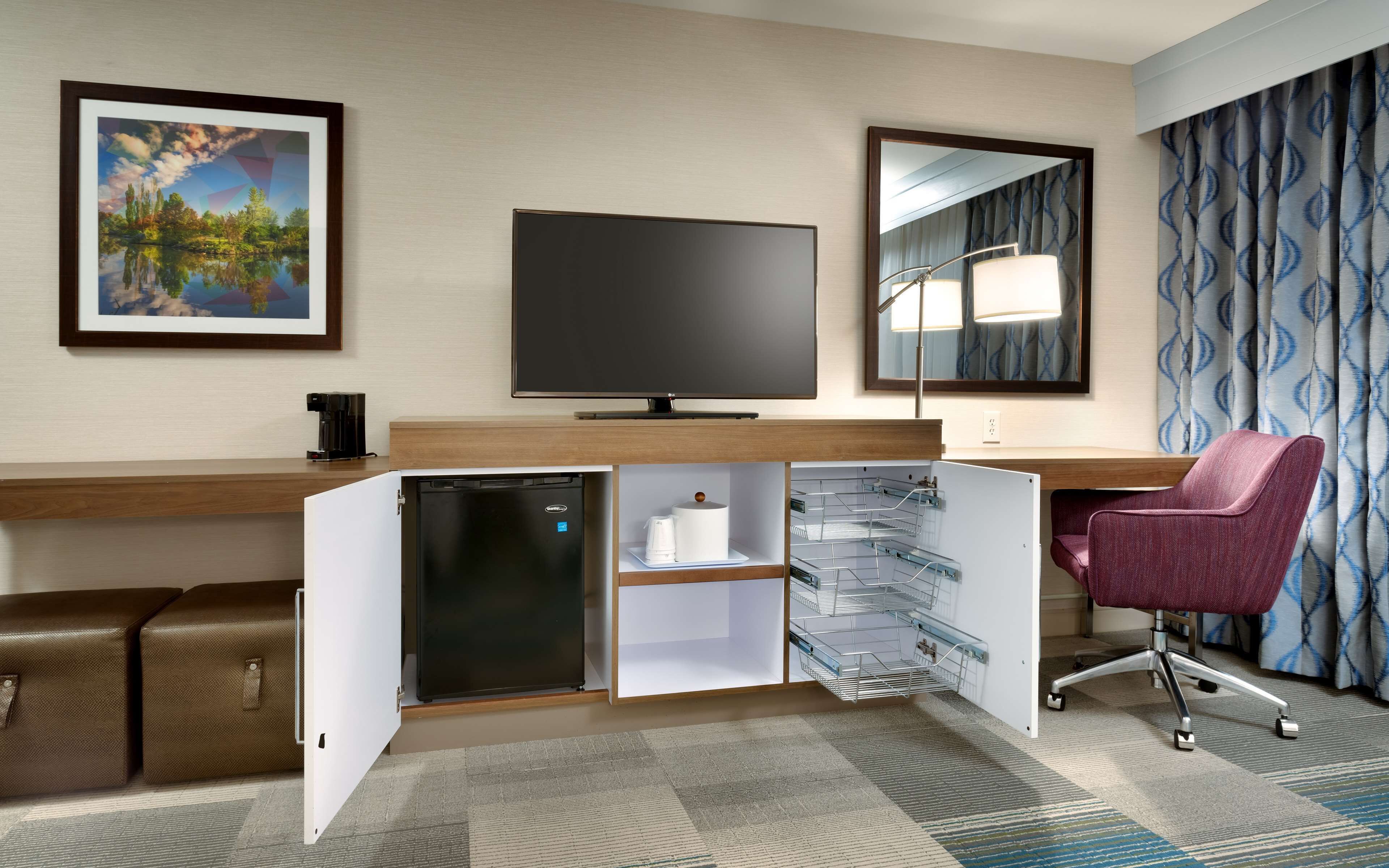 desk, laptop workspace, blackout curtains, iron/ironing board