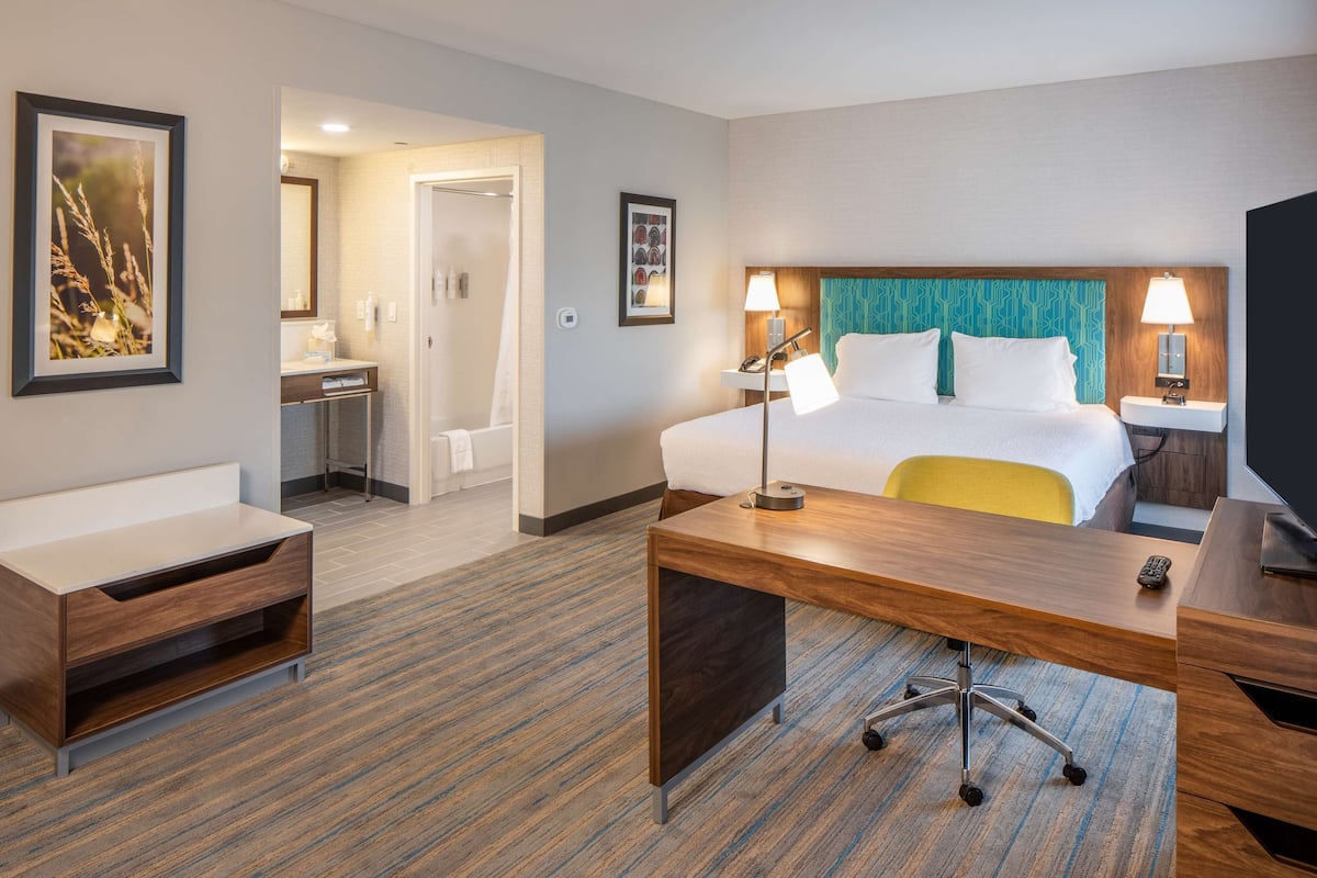 Premium bedding, pillow-top beds, desk, laptop workspace