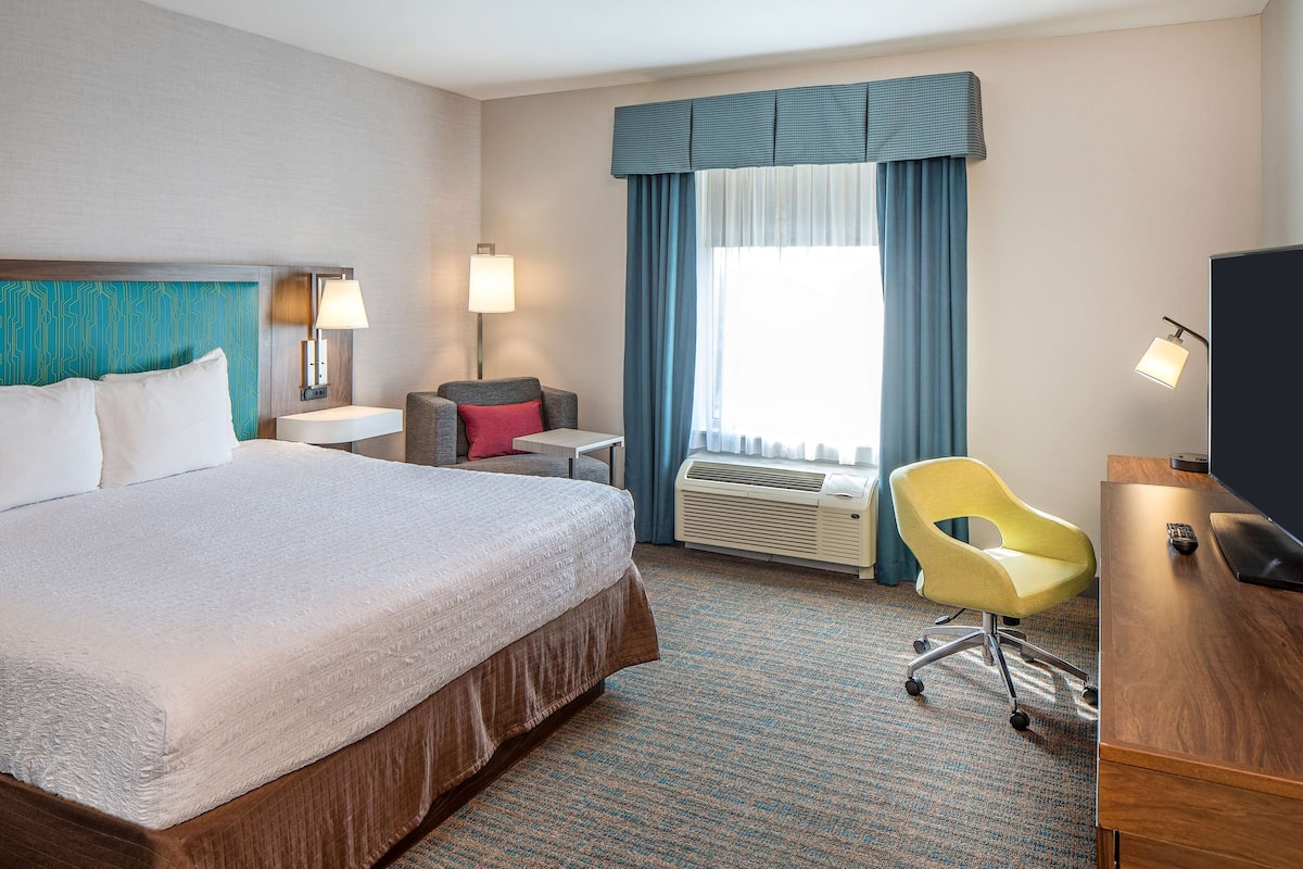 Premium bedding, pillow-top beds, desk, laptop workspace