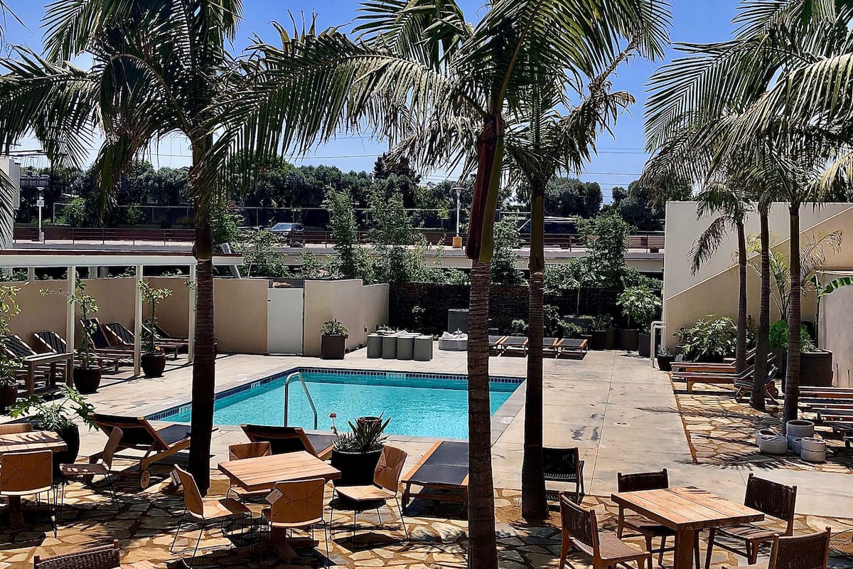 outdoor pool, free pool cabanas, pool loungers