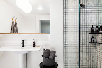 Frette Italian sheets, premium bedding, pillowtop beds, in-room safe at Hotel June West L.A., a Member of Design Hotels