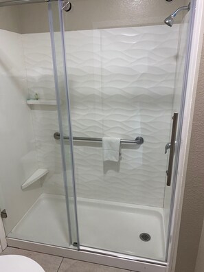 Shower, hair dryer, towels